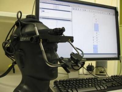 A desktop eye-tracker in front of a monitor